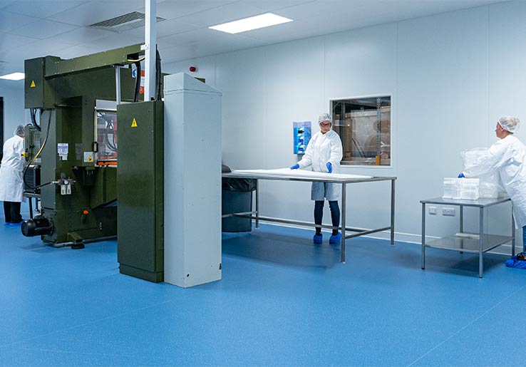 Employees in AQF Medical's cleanroom manufacturing room